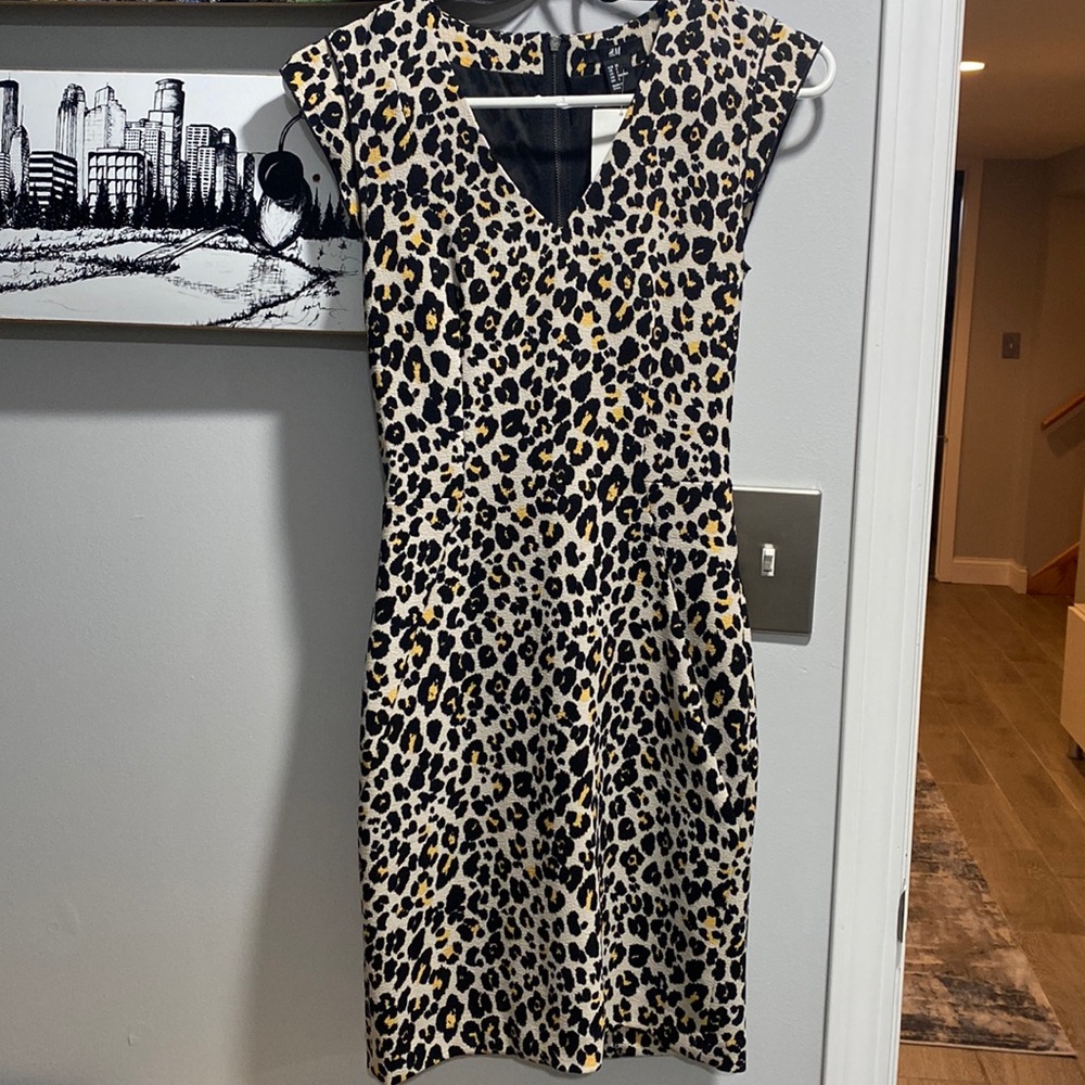 Never used, animal print dress